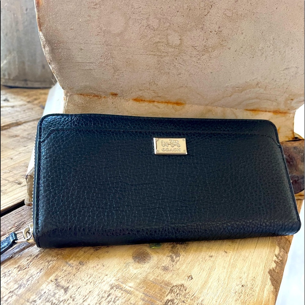Brand new Coach zip around wallet. Pebbled leather.